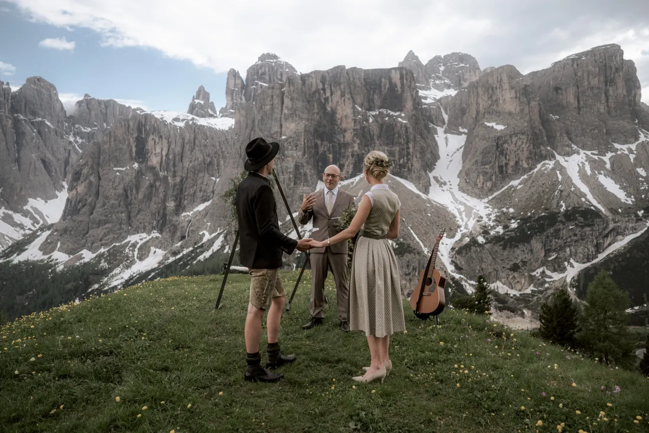 A small ceremony on the meadow beneath the walls of the Sella group
