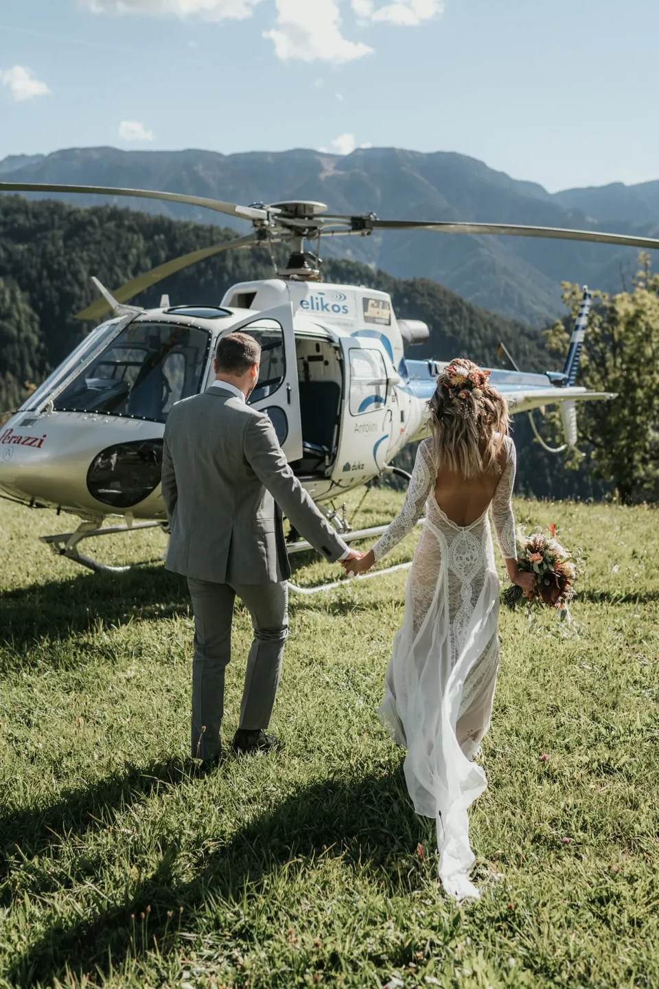 The couple walking to the helicopter to board for the flight