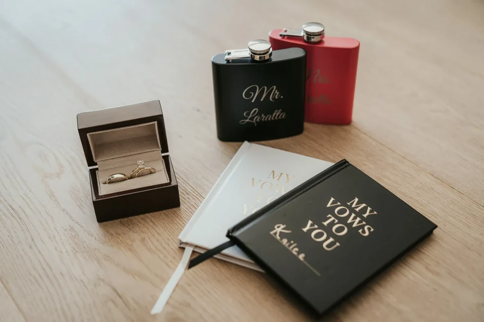 Vow books, rings and personalised details ready for the day