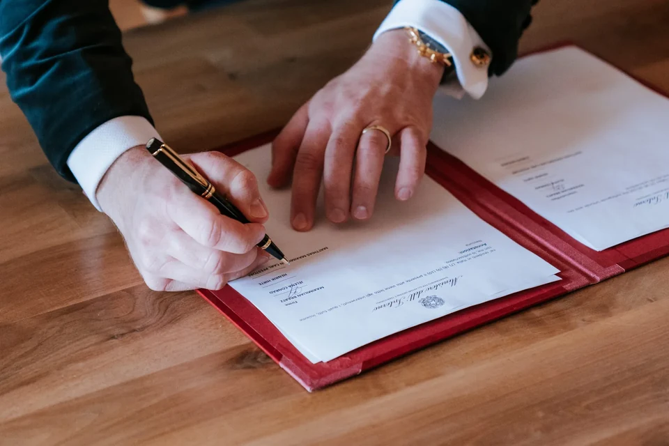 Signing the marriage documents