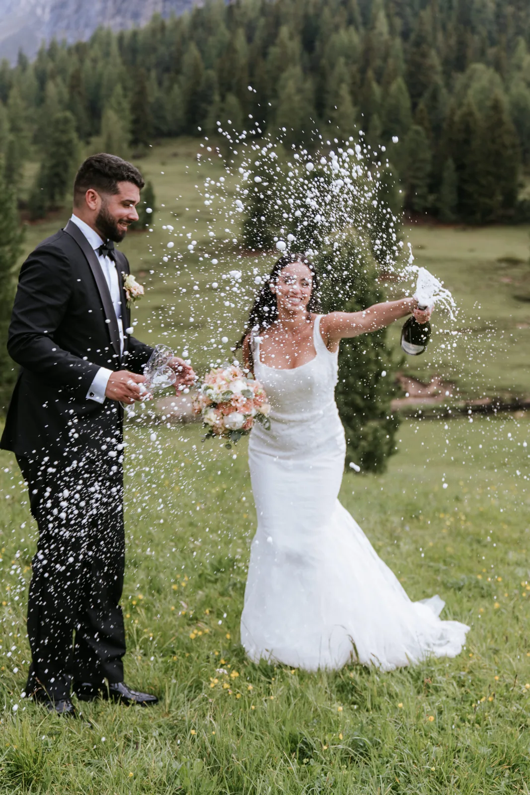 A spray of champagne to celebrate on the mountain