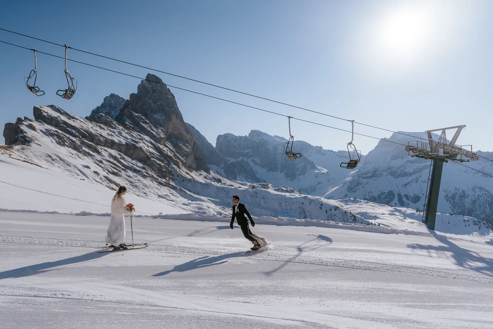 The bride on skis in her wedding dress