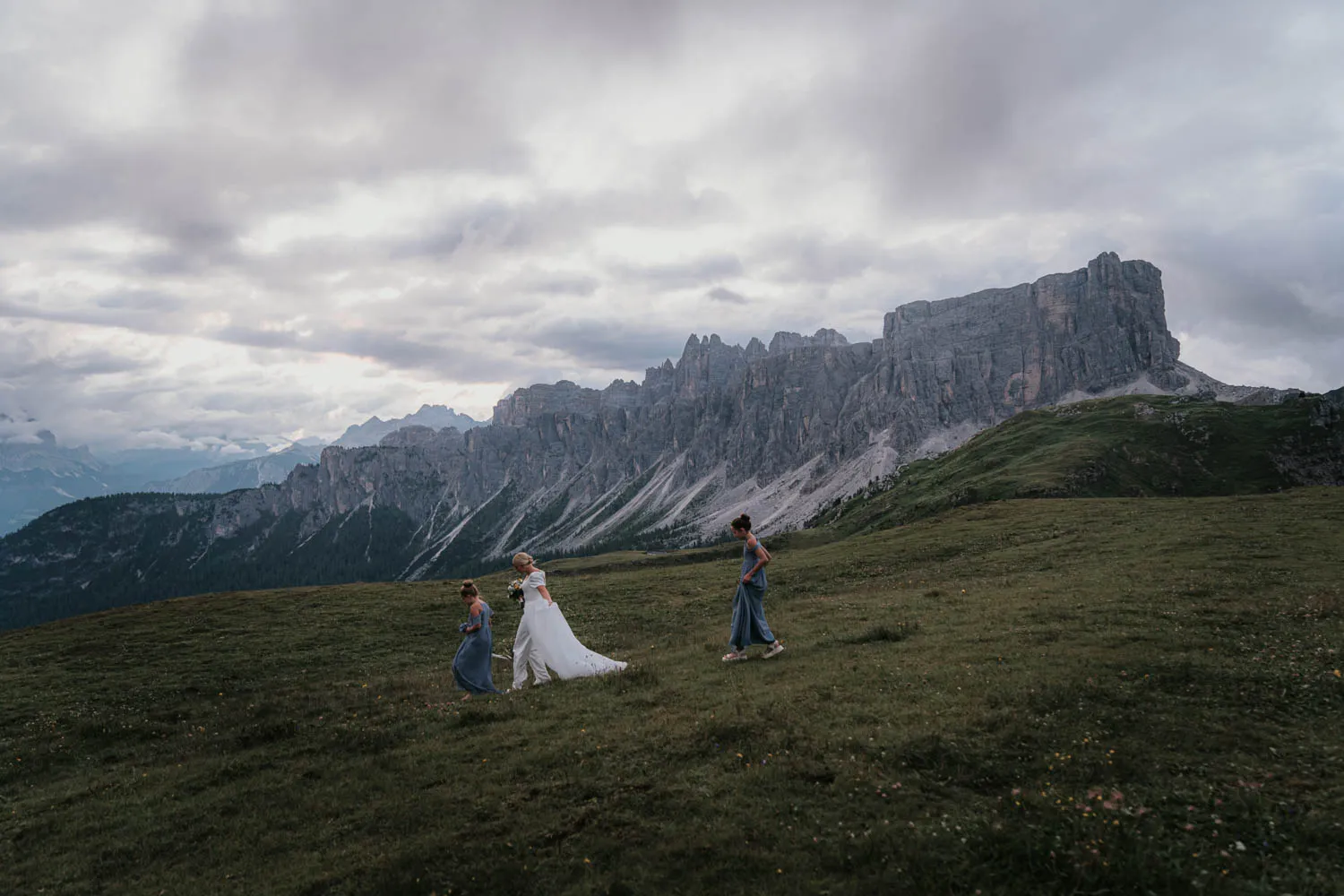 Dress and veil caught by the wind on an open meadow